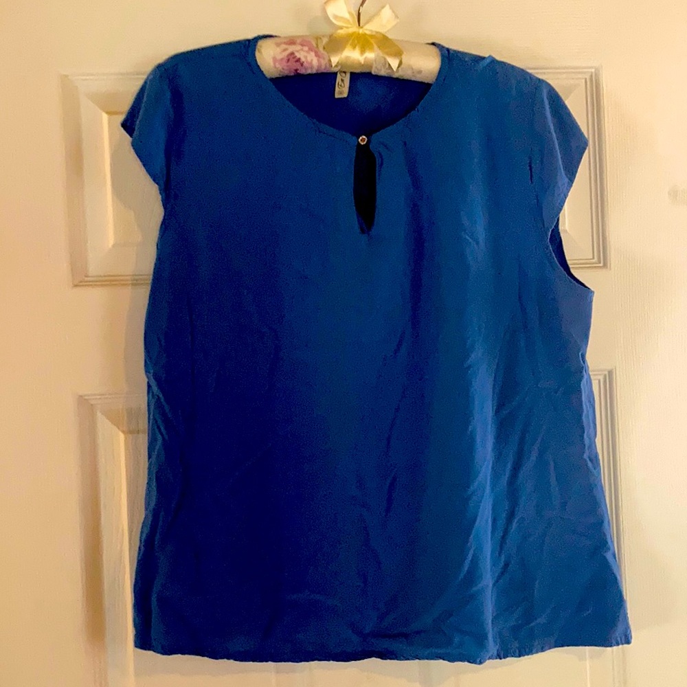 Lightweight blue tank top with teardrop shape cutout